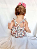 Smocked happy easter thumper tie romper